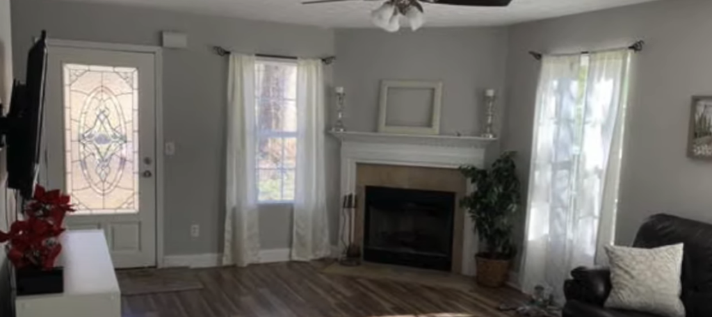 Fireplace With White Wood Wall